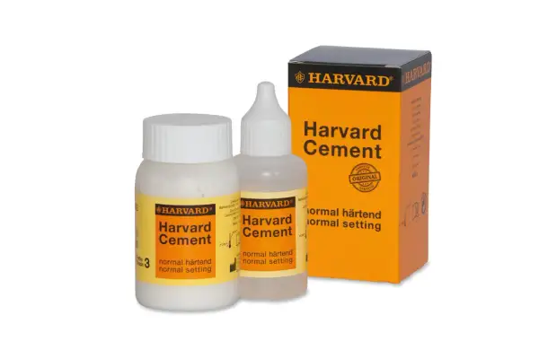 Harvard Cement - najmocniejszy cement stomatologiczny w zestawie z pudełkiem i buteleczkami.